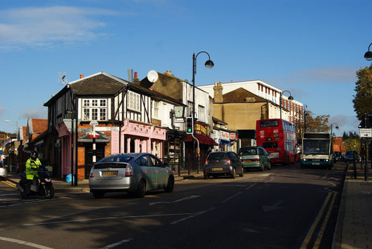 Loughton High Road with shops and businesses - vibrant Essex town near Epping Forest popular with families seeking mortgage broker and mortgage advice for first-time buyers and whole-of-market advisers